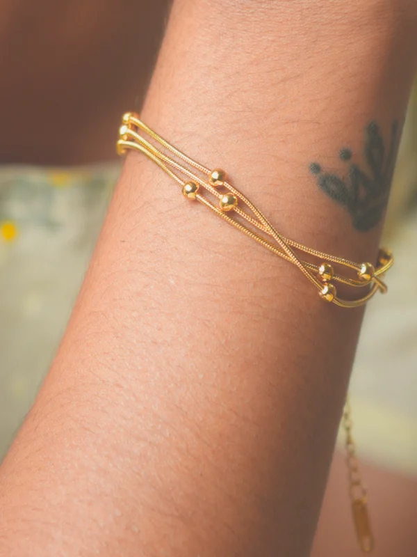 Golden Orbit Multi-Strand Bracelet